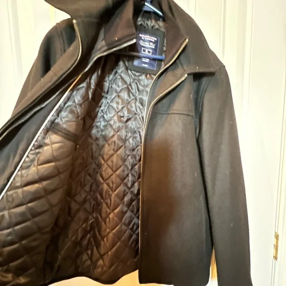 Size small Roundtree and Yorke black pea coat with quilted inner lining